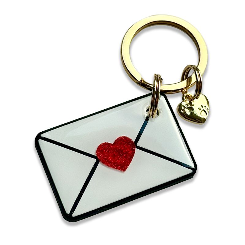 A picture of <p>Unser Special zum Valentinstag 2026: eine Hundemarke in Briefform mit einem roten Herz als Highlight in 3d-Optik.</p><p>Für einen authentischen Look empfehlen wir nur einen Rückseiten-Text. Auf Wunsch kann aber auch der Name auf die Vorderseite geschrieben werden.</p><p>Ein kleiner Marken-Charm kann optional dazu bestellt werden und ist standardmäßig nicht enthalten.</p>